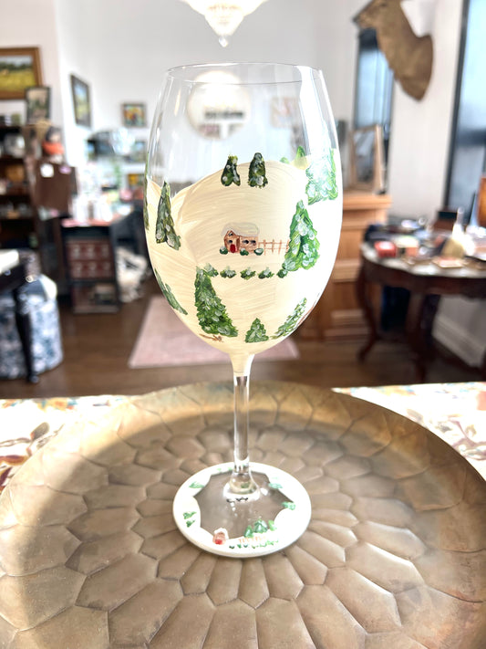 Hand Painted Winter Lodges Red Wine Glass by Carol Moore